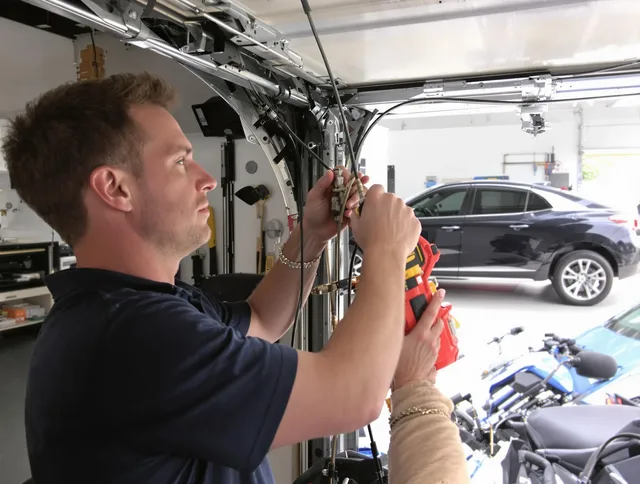 Burbank Garage Door Repair safety certified technician performing cable replacement in Burbank