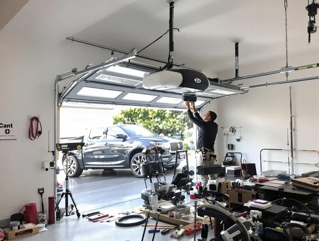 Burbank Garage Door Repair specialist installing smart garage door opener system in Burbank home